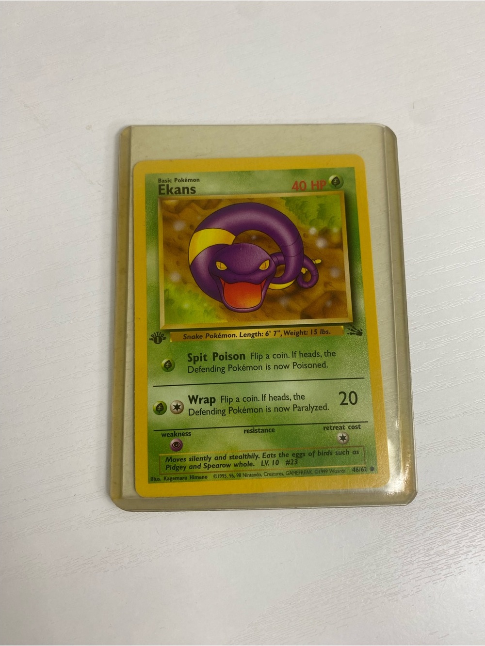 1999 Pokemon Fossil 46 Ekans 1st edition Pokemon card